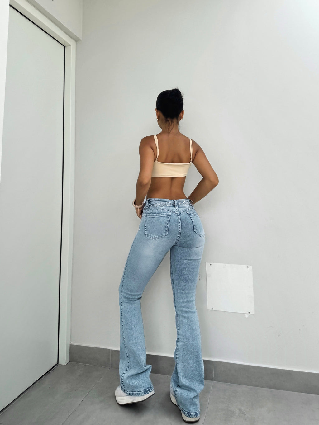 Flare jean frosteado